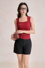 Cotton knitted shirt with round neck and ruffled waist
