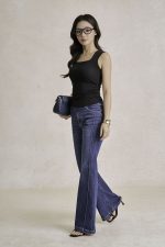 Cotton knitted shirt with round neck and ruffled waist