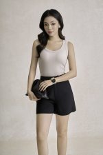 Cotton knitted shirt with round neck and ruffled waist