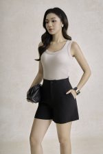 Cotton knitted shirt with round neck and ruffled waist
