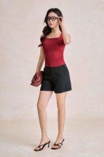 Cotton knitted shirt with round neck and ruffled waist