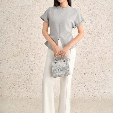 Cotton knitted T-shirt with round neck, short sleeves, slit waist, styled hem