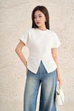 Cotton knitted T-shirt with round neck, short sleeves, slit waist, styled hem