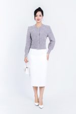 High-end fashion shimmer sweater with round neck and decorative stone buttons