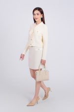 High-end fashion sweater with German collar and chest, faux-panelled pockets and high-quality stone buttons