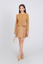 High-end fashion sweater with German collar and chest, faux-panelled pockets and high-quality stone buttons
