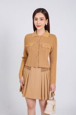 High-end fashion sweater with German collar and chest, faux-panelled pockets and high-quality stone buttons