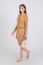 High-end fashion sweater with German collar and chest, faux-panelled pockets and high-quality stone buttons