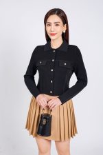 High-end fashion sweater with German collar and chest, faux-panelled pockets and high-quality stone buttons