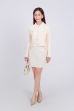 High-end fashion sweater with German collar and chest, faux-panelled pockets and high-quality stone buttons