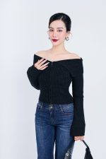 High-end fashion sweater with off-the-shoulder shape, flared sleeves and front zip