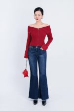 High-end fashion sweater with off-the-shoulder shape, flared sleeves and front zip