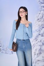 High-end fashion sweater with off-the-shoulder shape, flared sleeves and front zip