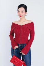 High-end fashion sweater with off-the-shoulder shape, flared sleeves and front zip