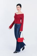High-end fashion sweater with off-the-shoulder shape, flared sleeves and front zip