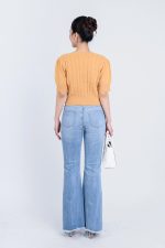 High-end fashion sweater with round neck, puffed sleeves and pearl-embellished body
