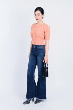 High-end fashion sweater with round neck, puffed sleeves and pearl-embellished body