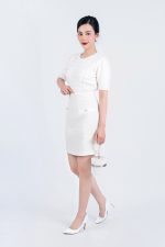 High-end fashion sweater with round neck, puffed sleeves and pearl-embellished body