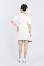 High-end fashion sweater with round neck, puffed sleeves and pearl-embellished body