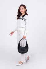 High-end fashion sweater with straight German collar and chest pattern, horizontal striped hem, elastic waistband, front closure