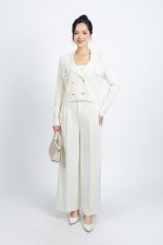 High-end fashion sweater with straight neckline and decorative buttons
