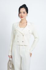 High-end fashion sweater with straight neckline and decorative buttons