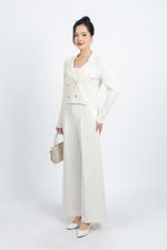 High-end fashion sweater with straight neckline and decorative buttons