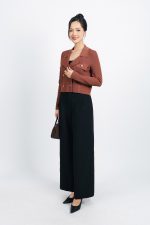 High-end fashion sweater with straight neckline and decorative buttons