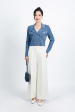 High-end fashion sweater with straight neckline and decorative buttons