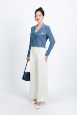 High-end fashion sweater with straight neckline and decorative buttons