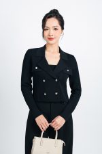 High-end fashion sweater with straight neckline and decorative buttons
