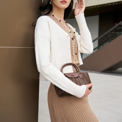 High-end fashion sweater with V-neck, buttoned front