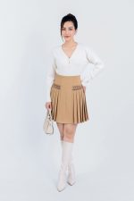 High-end fashion sweater with V-neck, buttoned front