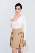 High-end fashion sweater with V-neck, buttoned front