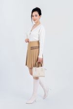 High-end fashion sweater with V-neck, buttoned front