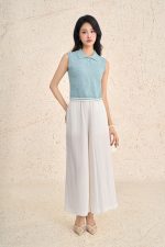 High-end sweater with round neck and sleeveless buttoned hem with line pattern