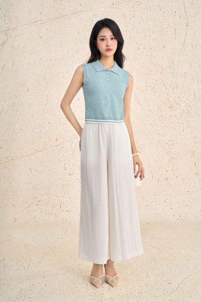 High-end sweater with round neck and sleeveless buttoned hem with line pattern