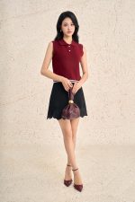 High-end sweater with round neck and sleeveless buttoned hem with line pattern