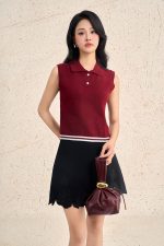 High-end sweater with round neck and sleeveless buttoned hem with line pattern