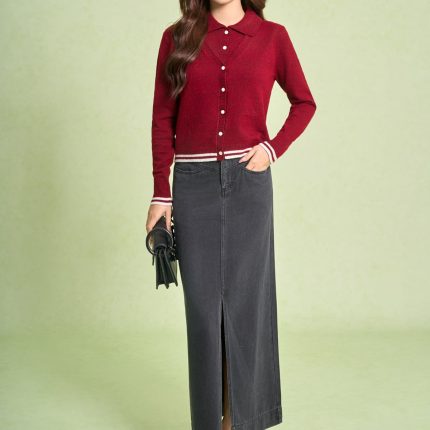 High-end sweater with V-neck, long sleeves, and striped hem to create a button-front style