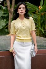 High-quality knitted sweater with German collar and buttoned sleeves, fashionable fitted hem