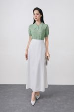 High-quality knitted sweater with German collar and buttoned sleeves, fashionable fitted hem