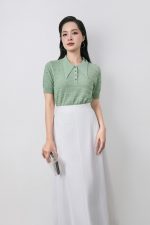High-quality knitted sweater with German collar and buttoned sleeves, fashionable fitted hem