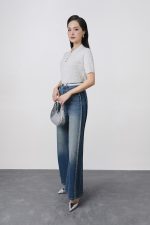 High-quality knitted sweater with German collar and buttoned sleeves, fashionable fitted hem