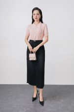 High-quality knitted sweater with German collar and buttoned sleeves, fashionable fitted hem
