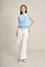 High-quality knitted sweater with loose shape, turn-down sleeves, fashionable stone-embellished collar, stylish elastic hem