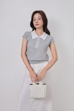 High-quality knitted sweater with loose shape, turn-down sleeves, fashionable stone-embellished collar, stylish elastic hem
