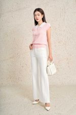 High-quality knitted sweater with loose shape, turn-down sleeves, fashionable stone-embellished collar, stylish elastic hem