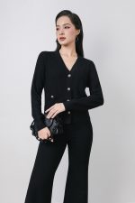 High-quality knitted sweater with V-neck, plaid pattern, and fashionable stone buttons with pockets