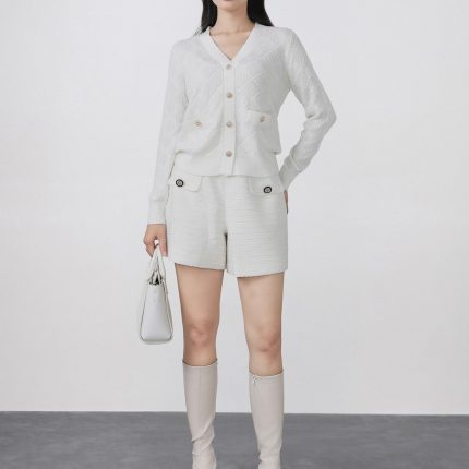 High-quality knitted sweater with V-neck, plaid pattern, and fashionable stone buttons with pockets